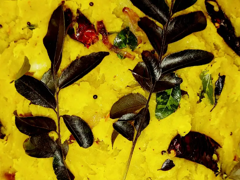 Kappa puzhukku, a Kerala dish made with cassava, coconut milk, and curry leaves.